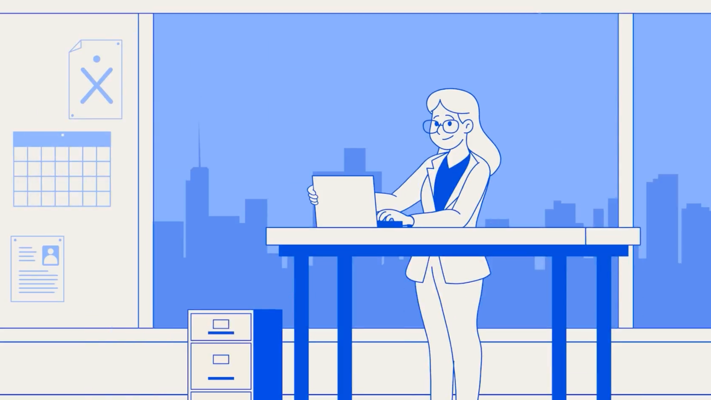 A blue and white illustration of a woman wearing glasses working on a laptop at a standing desk in an office overlooking a city skyline.