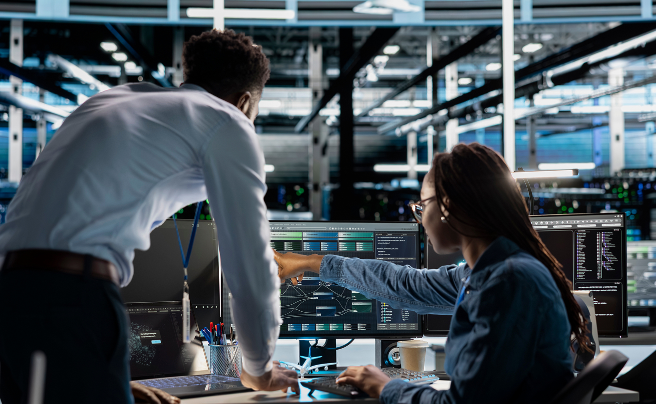 IT team collaborating in a data center to investigate security events.