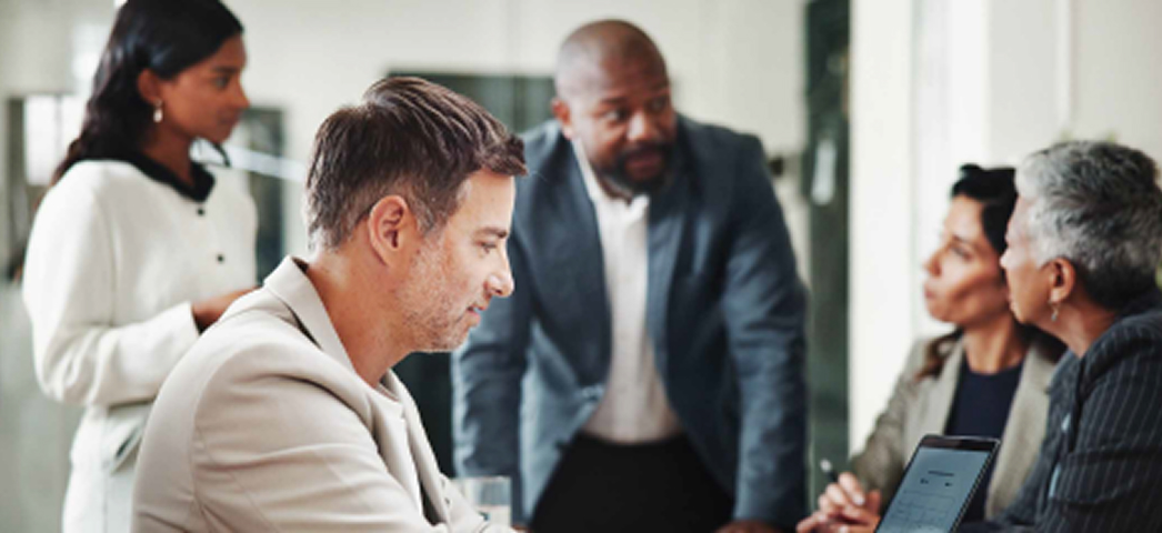 Business professionals collaborating during a team discussion.