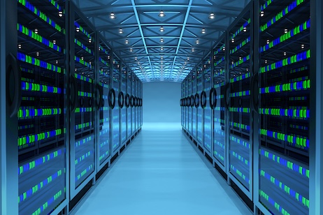 Rows of server racks in a data center supporting enterprise IT infrastructure.