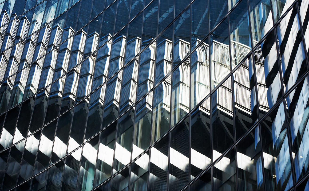 Modern office building facade representing business growth and infrastructure.