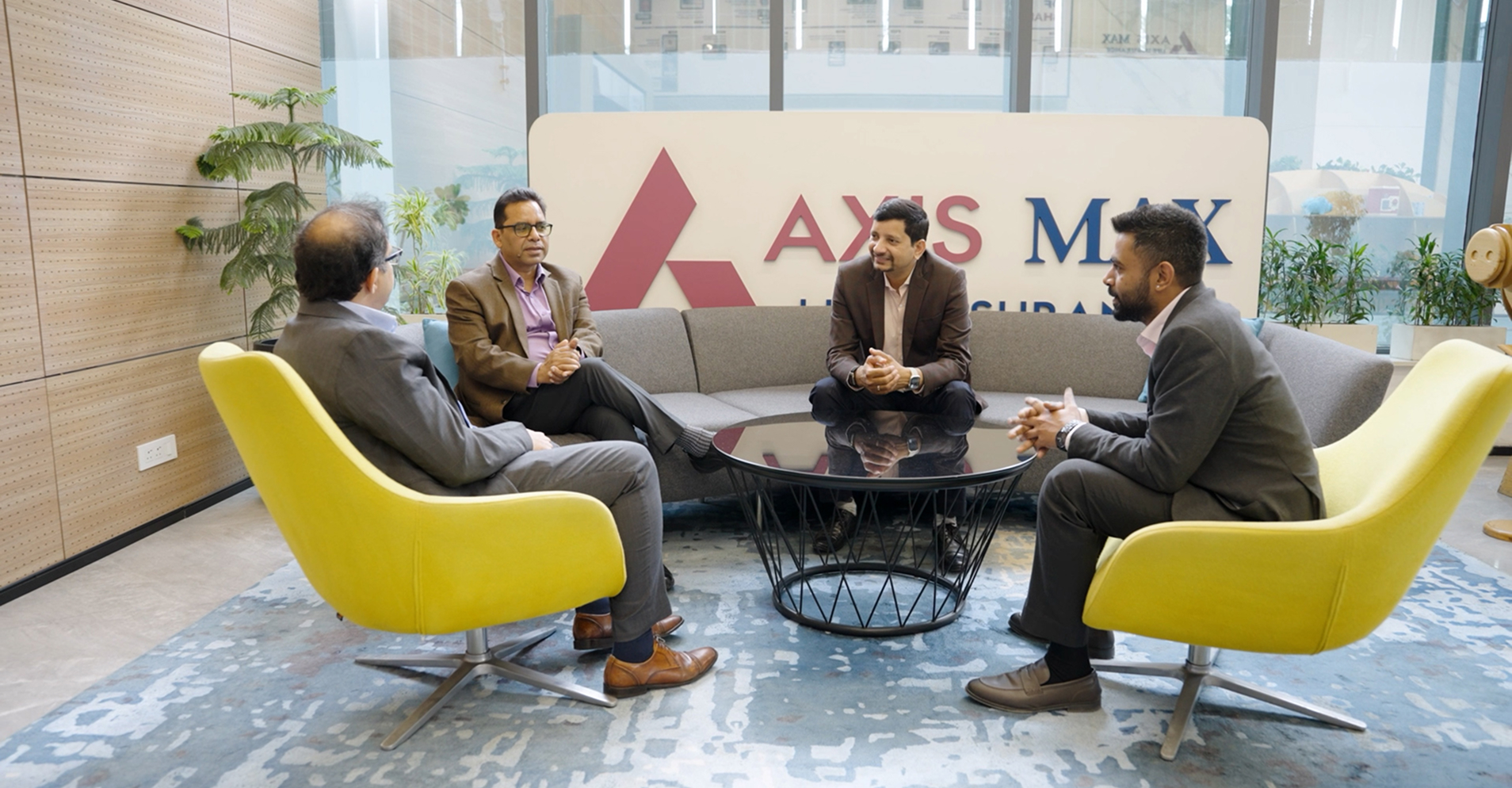 Business professionals meeting in a modern conference room.